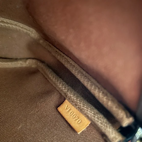 Authentic Louis Vuitton Pochette 
Code VI0070
Bought on Poshmark - Picture 2 of 11